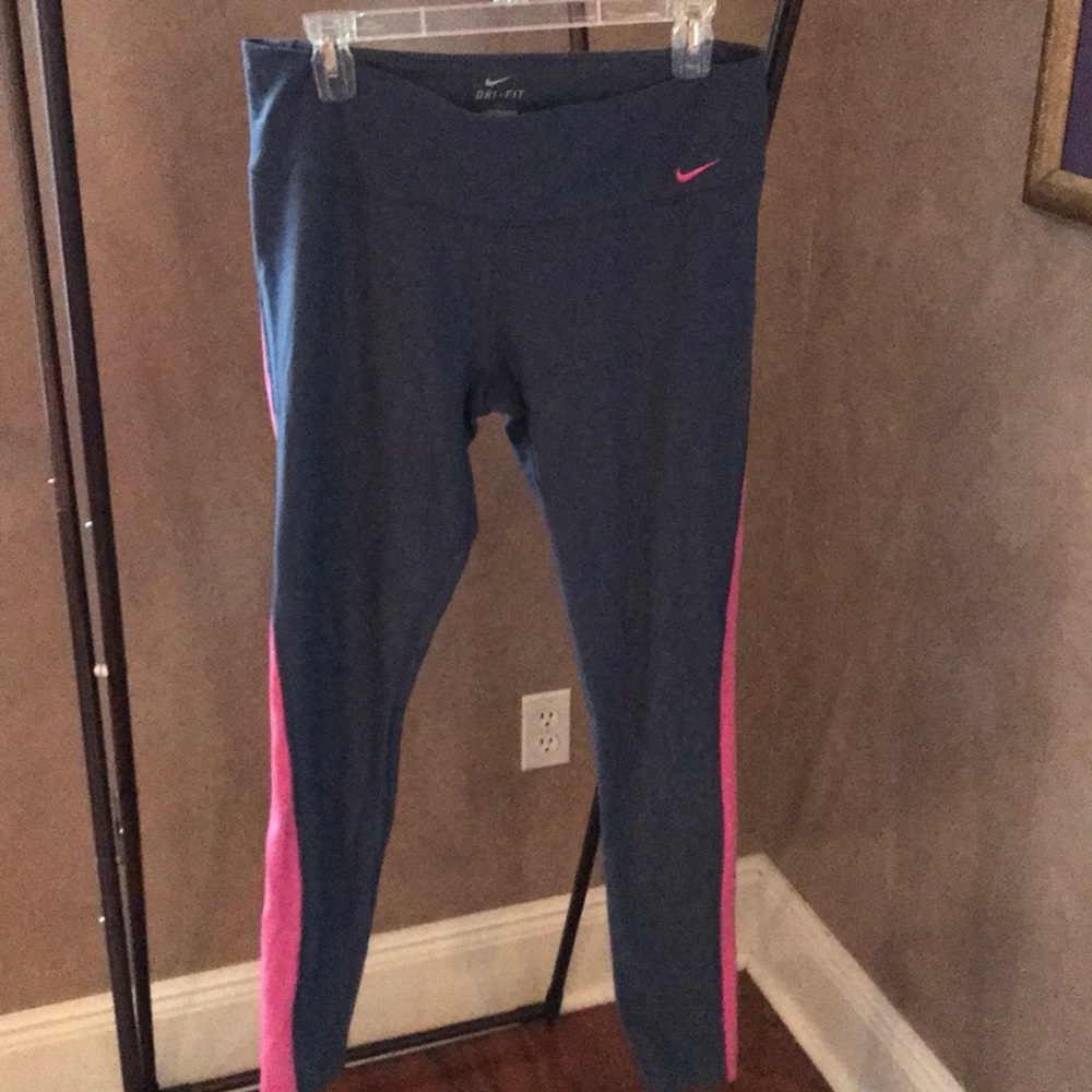 blue and pink Nike leggings
